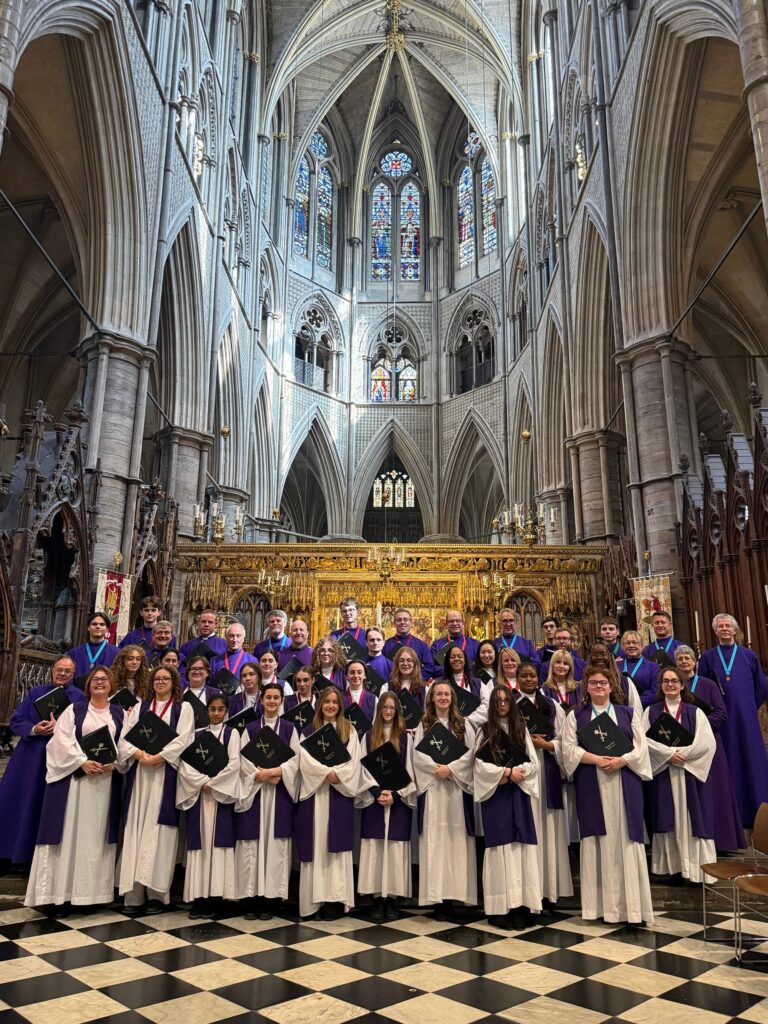 Members of Chingford Parish Church Choir singing at Westminster Abbey
